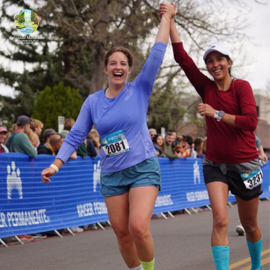 Runners crossing the finish line in Downtown Fort Collins