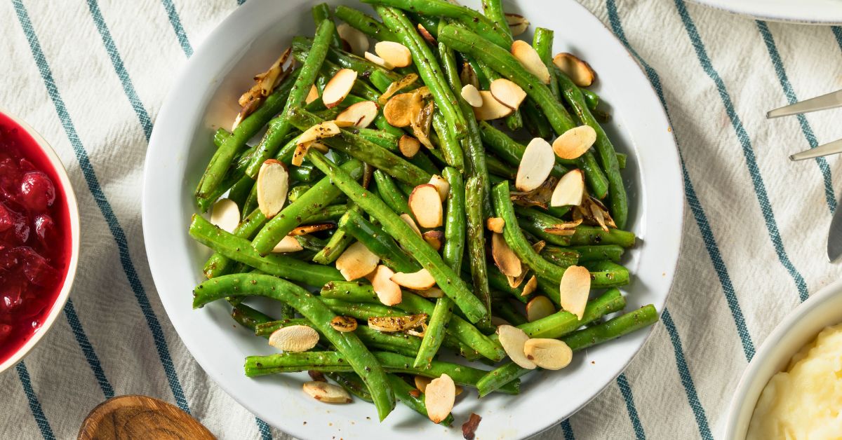 Green beans and roasted almonds are healthier foods for runners to enjoy on Thanksgiving